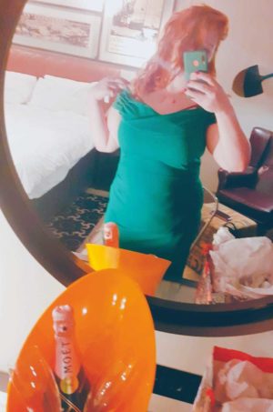 Green dress in mirror